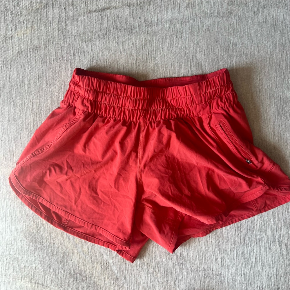 Lululemon Tracker Short V *4" in Pink Punch color